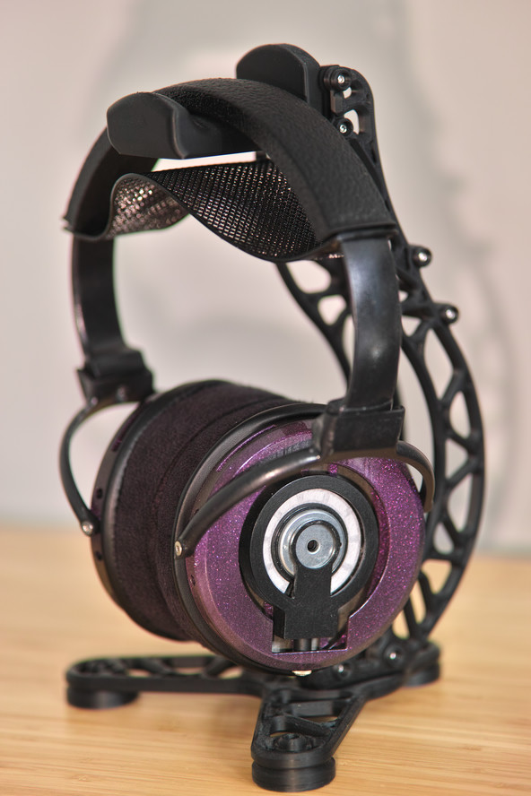A pair of DMS Project Omega Headphones with glittery purple cups